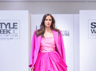 Woman walking down runway at Neiman Marcus